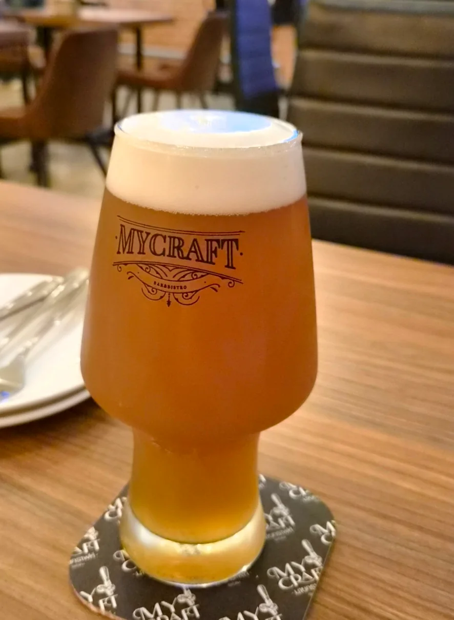 A freshly poured craft beer in a branded My Craft glass at the Hua Hin venue