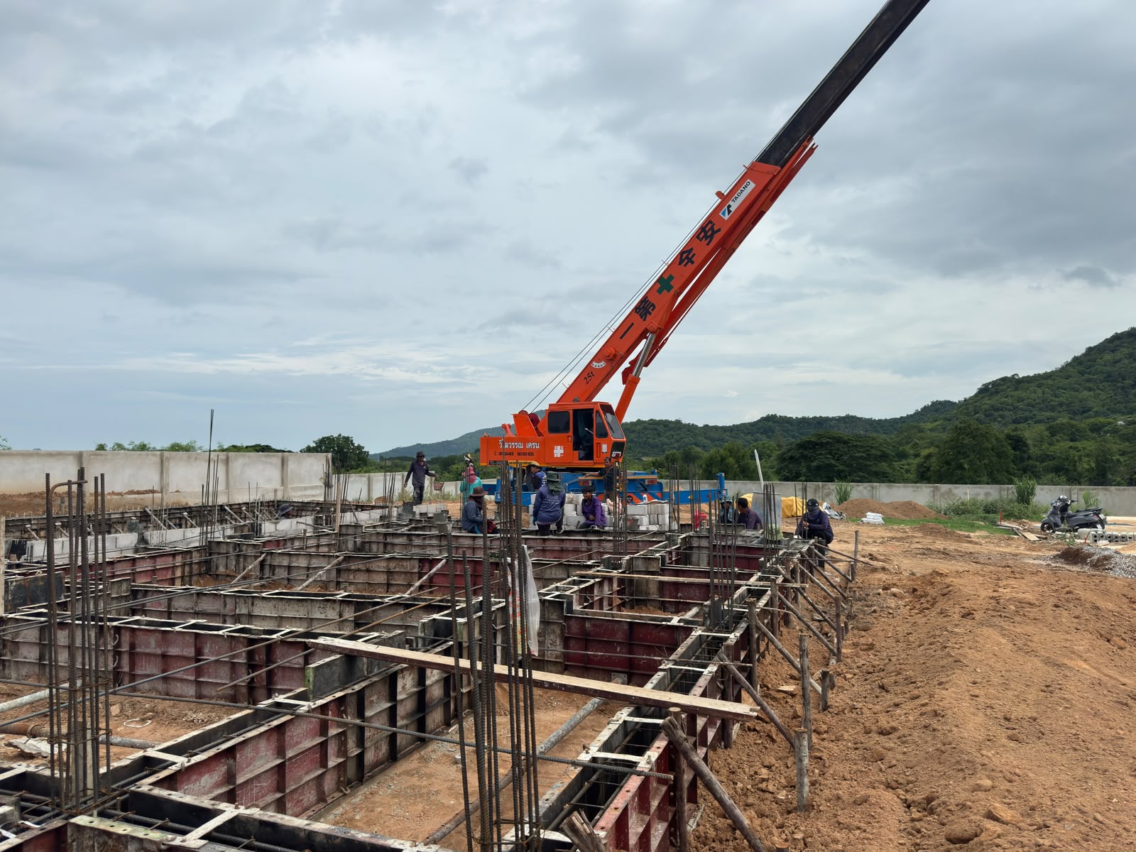 Ground beam works on a villa plot at The Vista Hua Hin with the surrounding hillside behind.